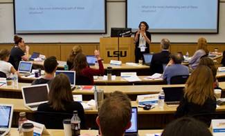 LSU faculty in a classroom with a lecturer at the front of the room during the 2019 CxC Summer Institute