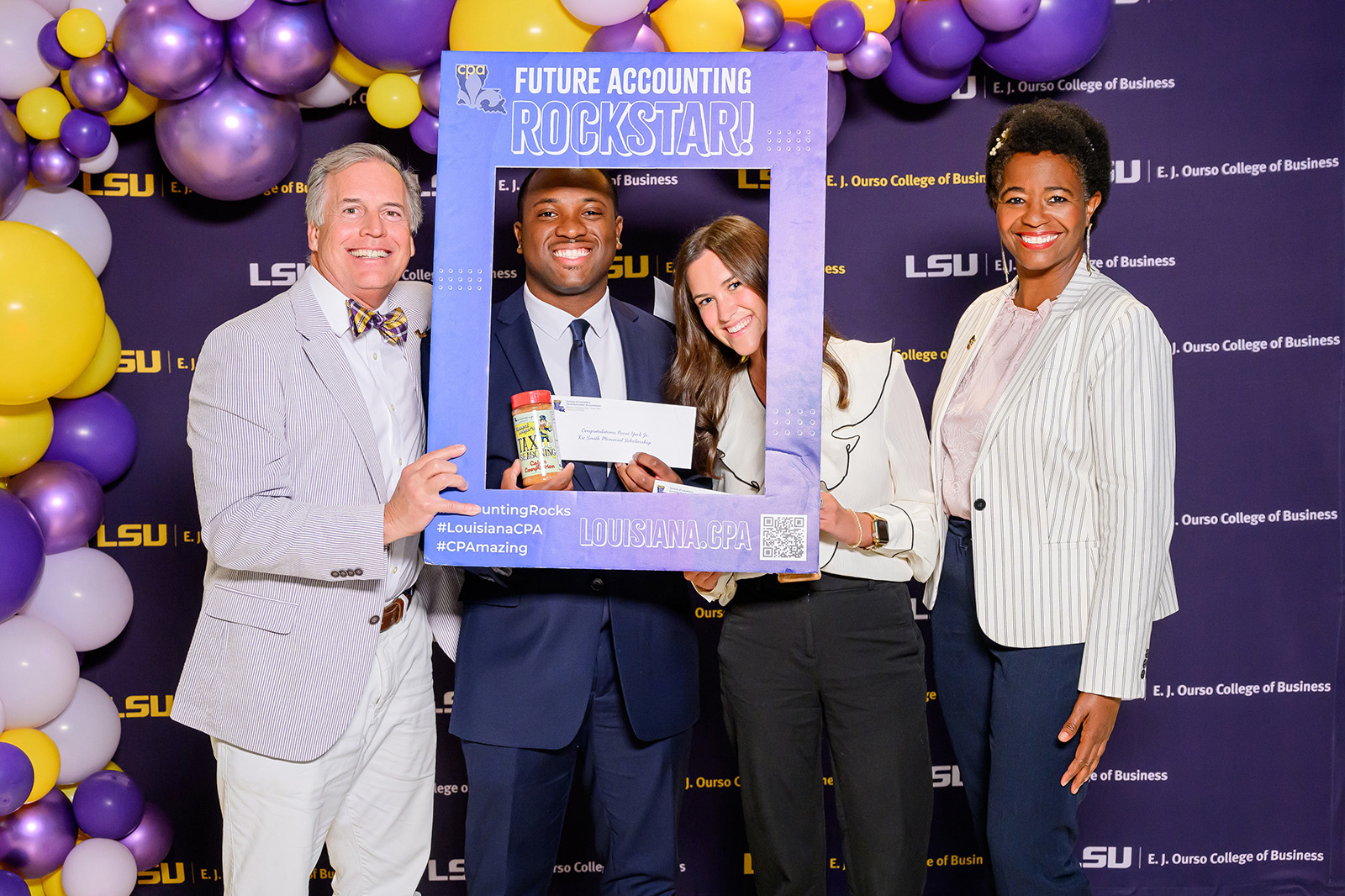 Ron Gitz presenting scholarship awards to students