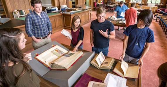 Hill Memorial Library and students