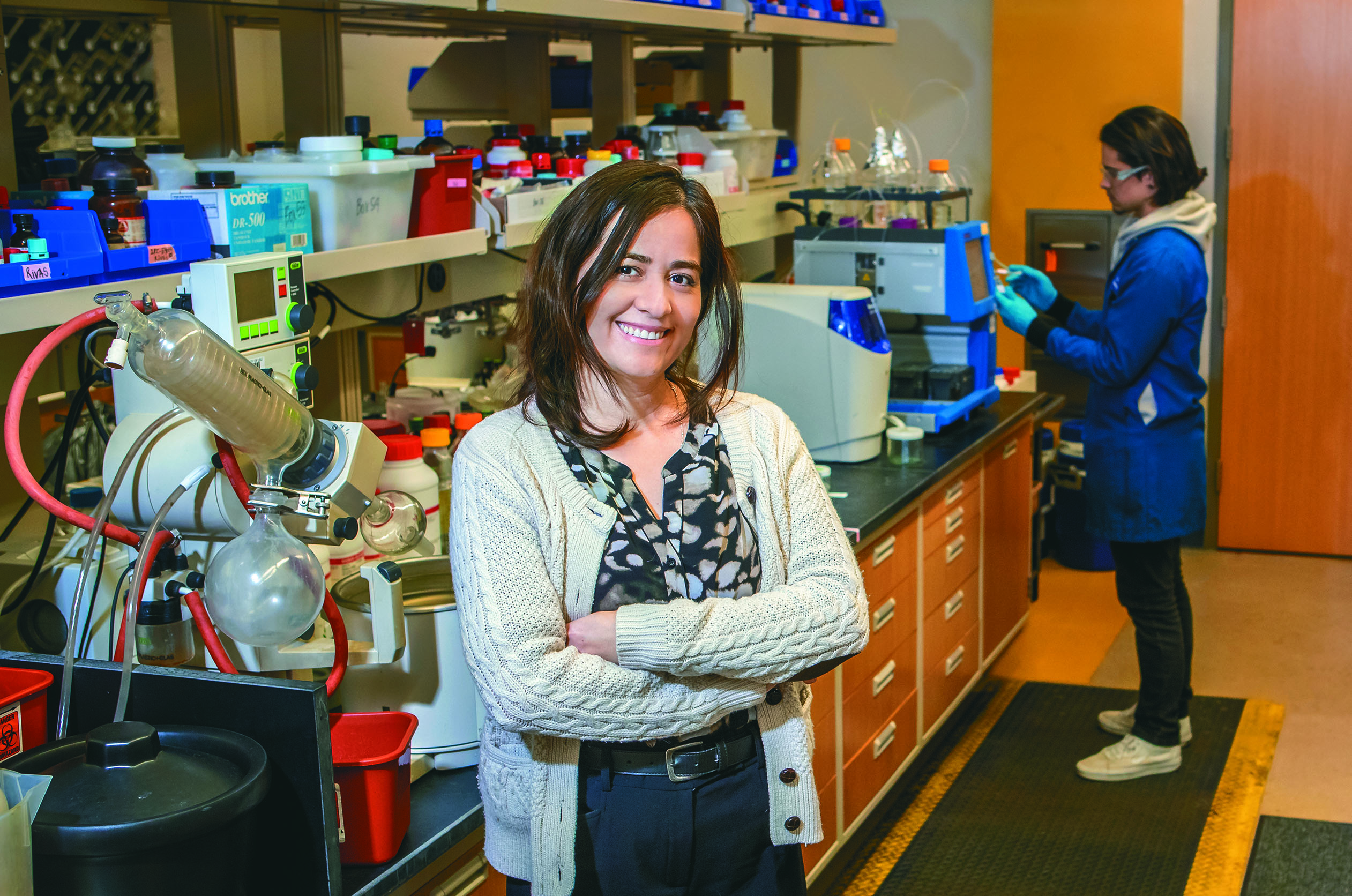 Fatima Rivas in lab with student